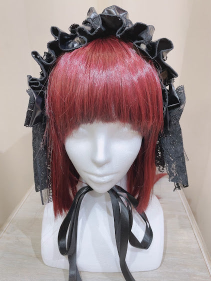 甜美的魔鬼孔眼人造皮革头连衣裙(黑色)