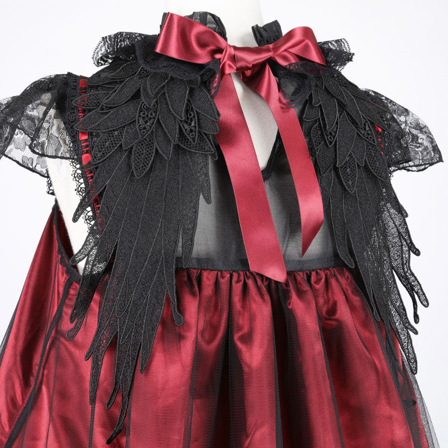 dark angel red dress The Winged Angel is Red and Black, and the Woman is Wearing a Black Dress Stock Image